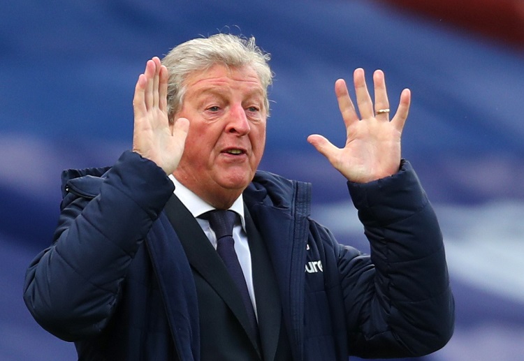 Crystal Palace manager Roy Hodgson doing hand gesture during a Premier League clash