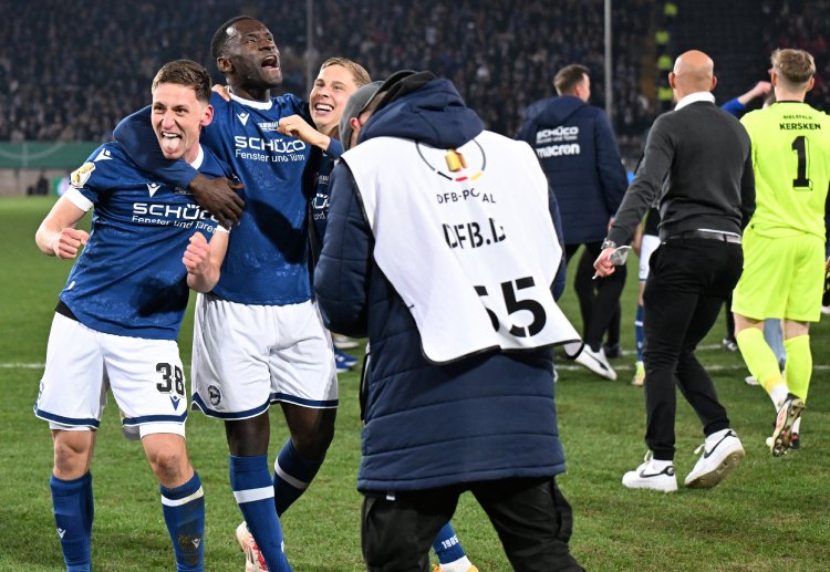 Bielefeld players rejoice after pulling off a DFB-Pokal semi-final upset against Leverkusen