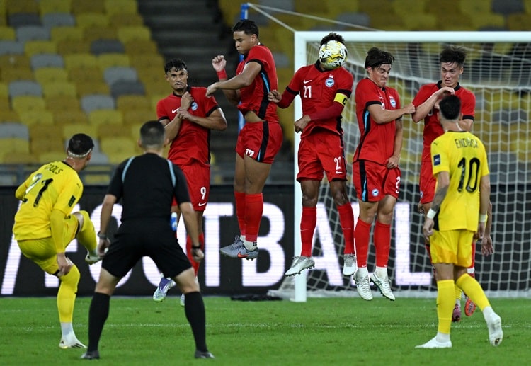 友谊赛 马来西亚男足在主场以2比1战胜新加坡，斯图尔特·威尔金与若昂·菲吉雷多分别攻入一球，帮助球队赢得胜利